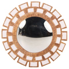 A Snow White Glass and Resin Convex "Sunburst" Mirror.