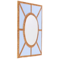 A Bold Geometric Blue Glass and Gold Resin Convex Wall Mirror