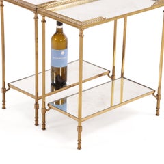 A Beautiful Pair of French Brass and Mirrored Tables, in the manner of Jansen