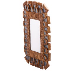 Petit miroir géométrique en résine bleue, dans le style de Line Vautrin