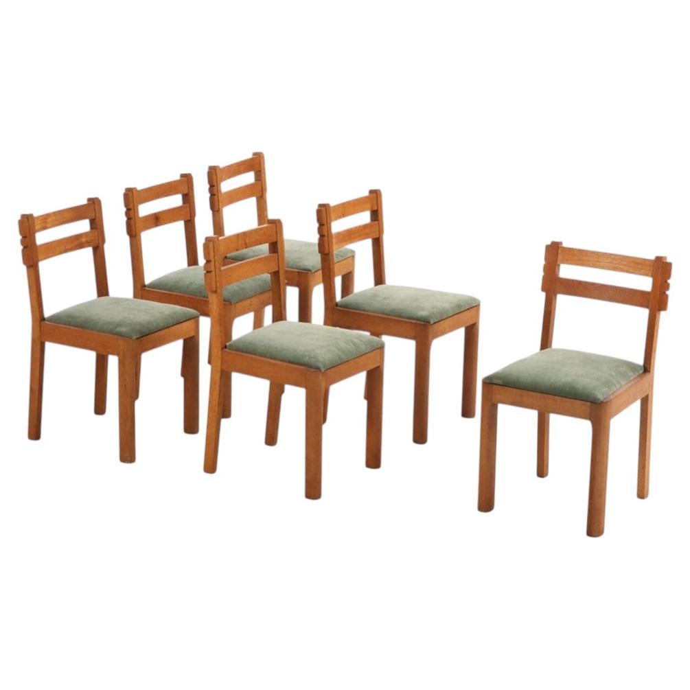 Six chaises de salle à manger françaises en chêne massif, attribuées à Charles Dudouyt, vers 1945 en vente