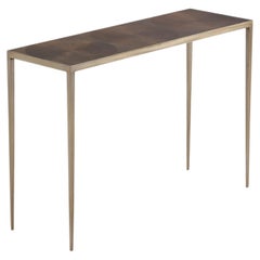 Une console en fer patiné bronze.