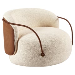 "Pietra" Curved Armchair with Leather Arms Upholstered in Bouclé Fabric