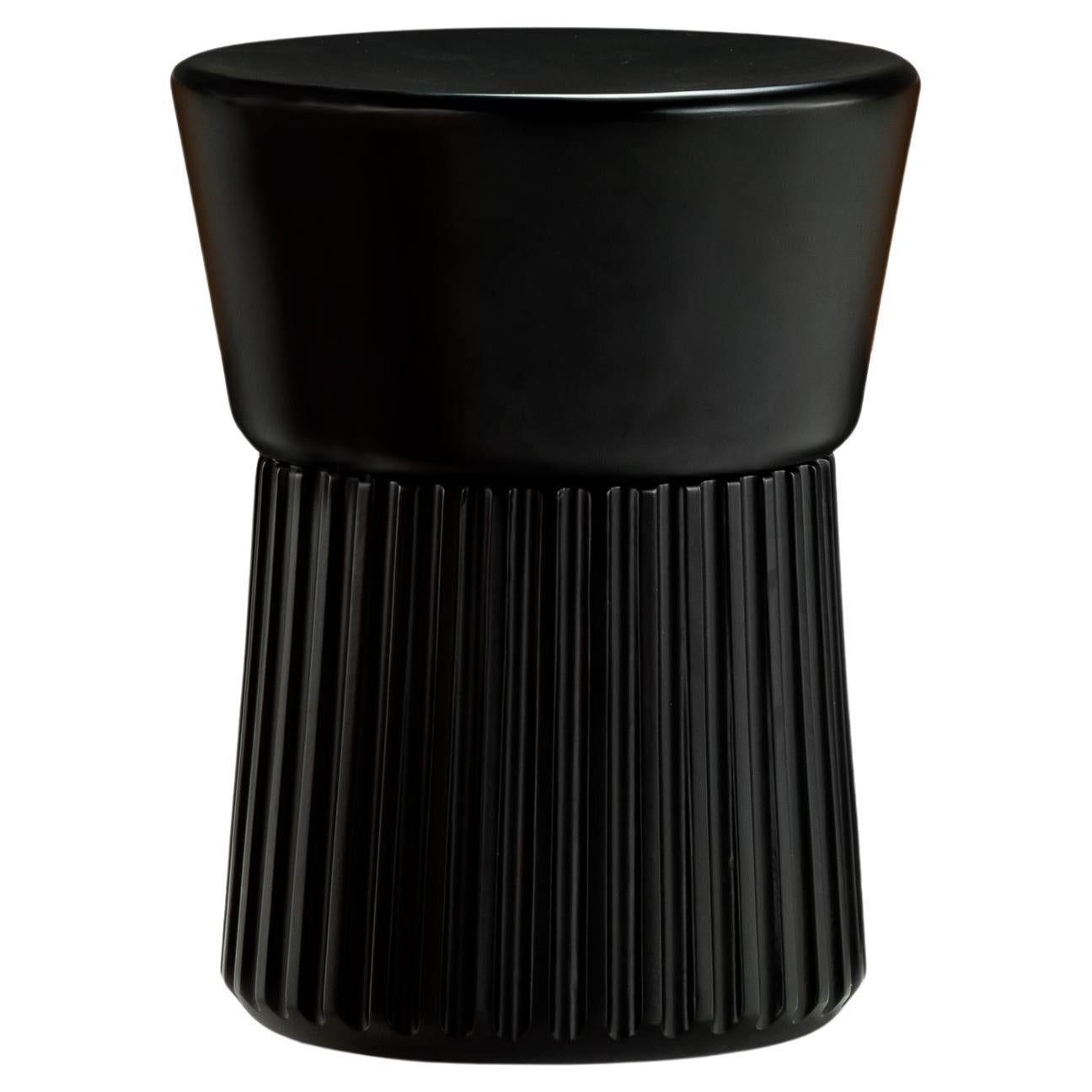 Le tabouret en bois 