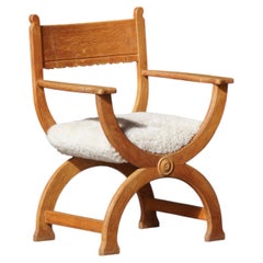 Henning Kjærnulf “Kurul” Sculptural Oak Armchair in Lambswool, Denmark, 1960s