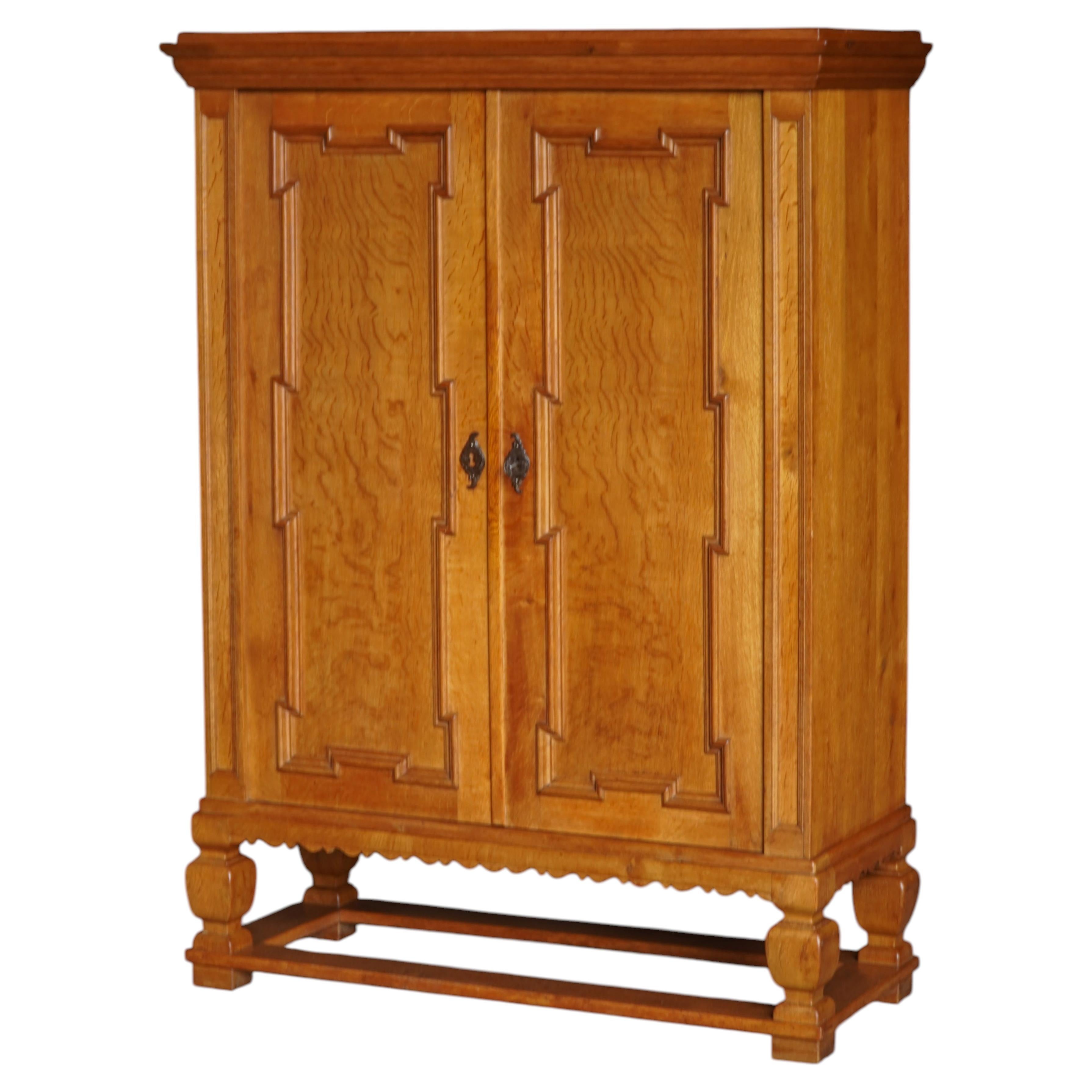Danish Modern, Brutalist Oak Cabinet with Carved Doors & Decorative Base, 1950s