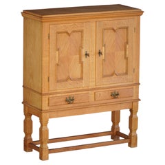 Danish Modern Oak Cabinet with Geometric Carved Doors, Henning Kjærnulf, 1960s