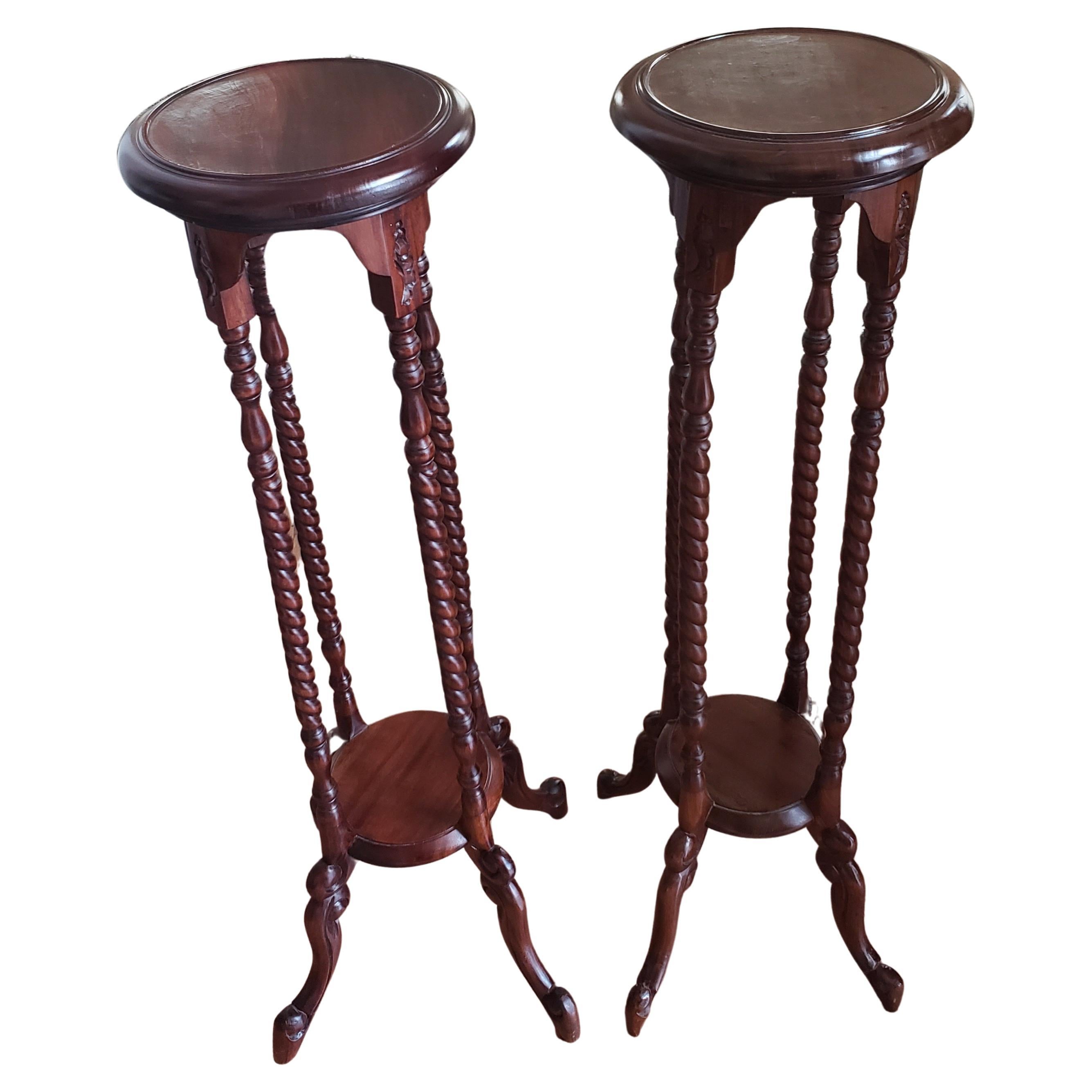 Exquisite pair of Vintage Victorianstyle mahogany barley twist legs plant stands.
Hand crafted in very good vintage condition. Measures 11.75