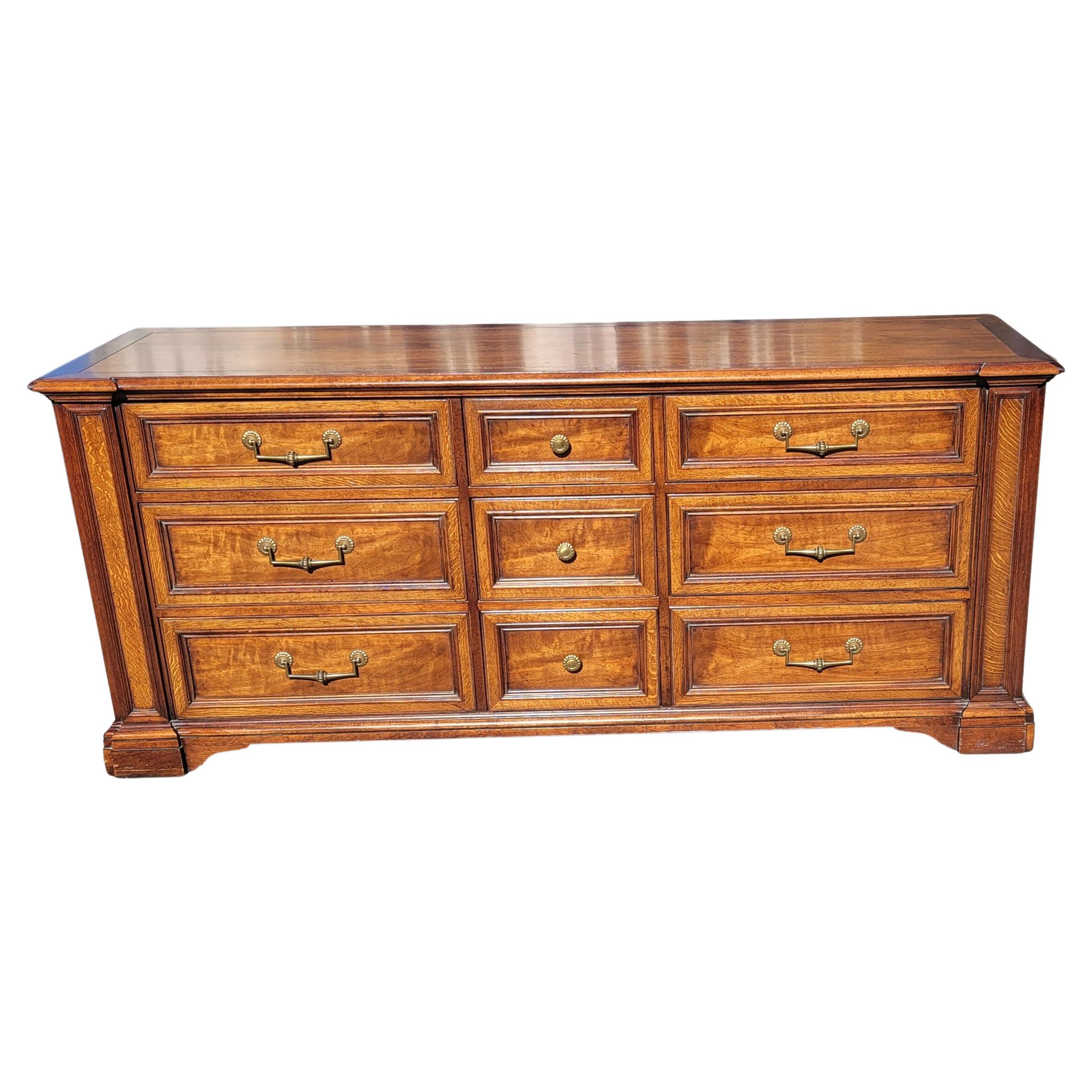 Very fine Henredon Fine Furniture 9-drawer triple dresser in great condition. 
Amazing combination of Solid walnut and mission oak construction. Dovetailed joinery drawers. Top drawers with dividers. Very clean in and out. on wheels
Measures 74