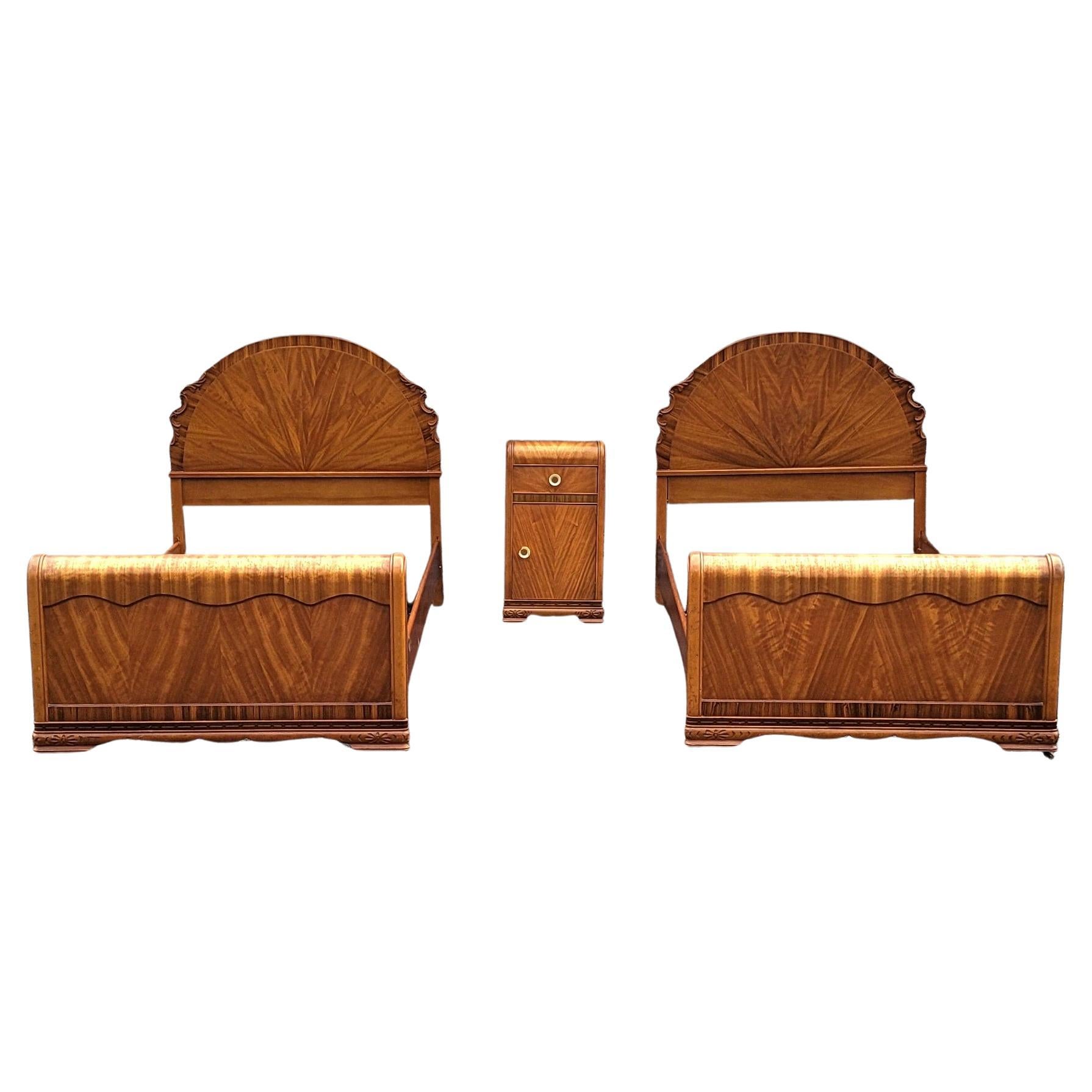 A Pair of 1930s Art Deco Mahogany Twin Size Bedsteads