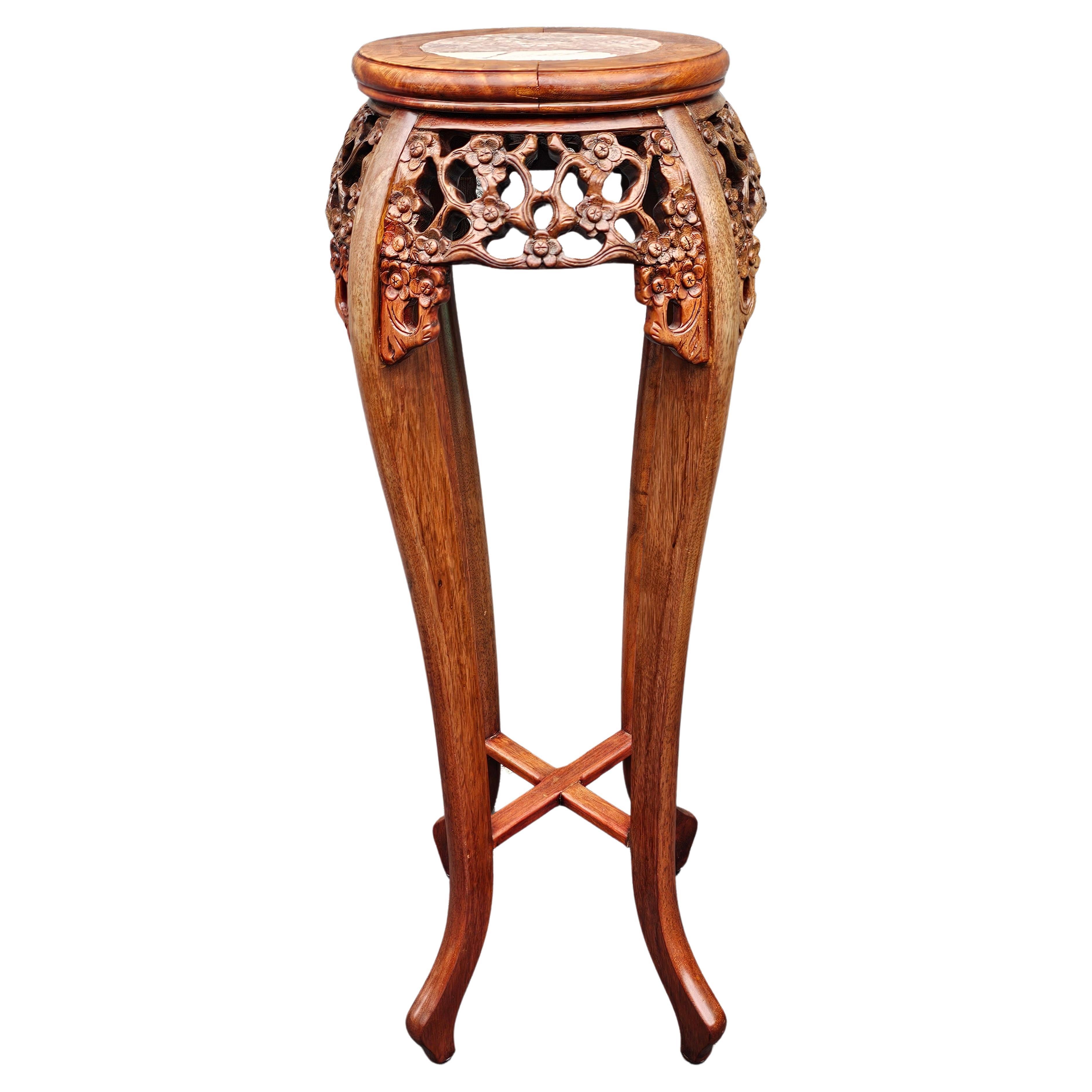 A mid century Chinese Carved Hardwood And Marble Inset Tabourette. Stands 36.5