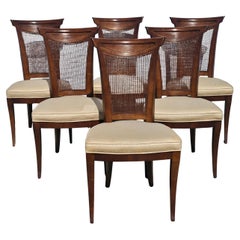 Juego de seis sillas de comedor Drexel Serie Consulado Respaldo de Caña de Nogal y Tapizado