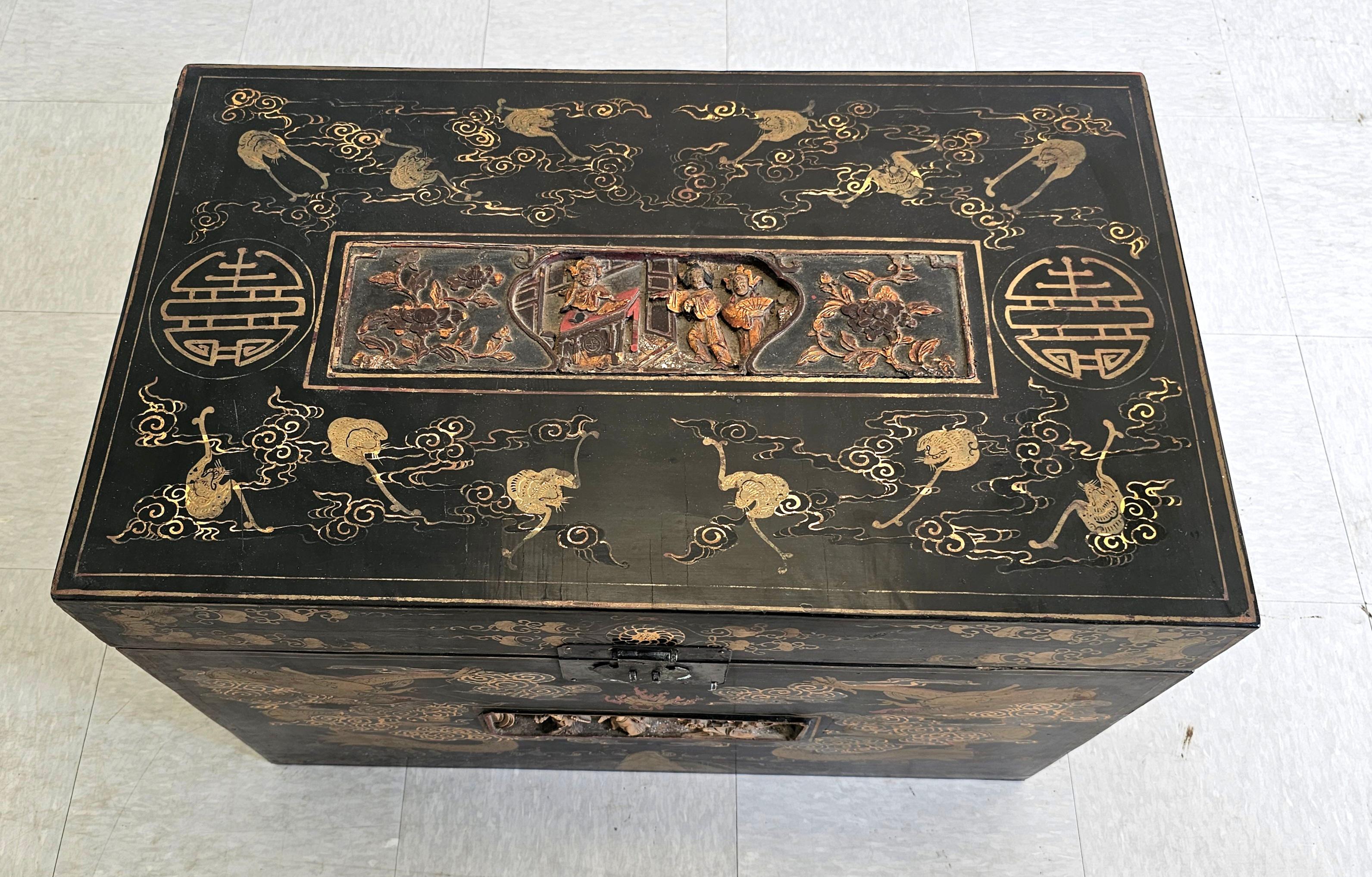 Hand-Carved Chinese Late Qing Dynasty Ebonized and Partial Gilt Decorated Packing Trunk For Sale