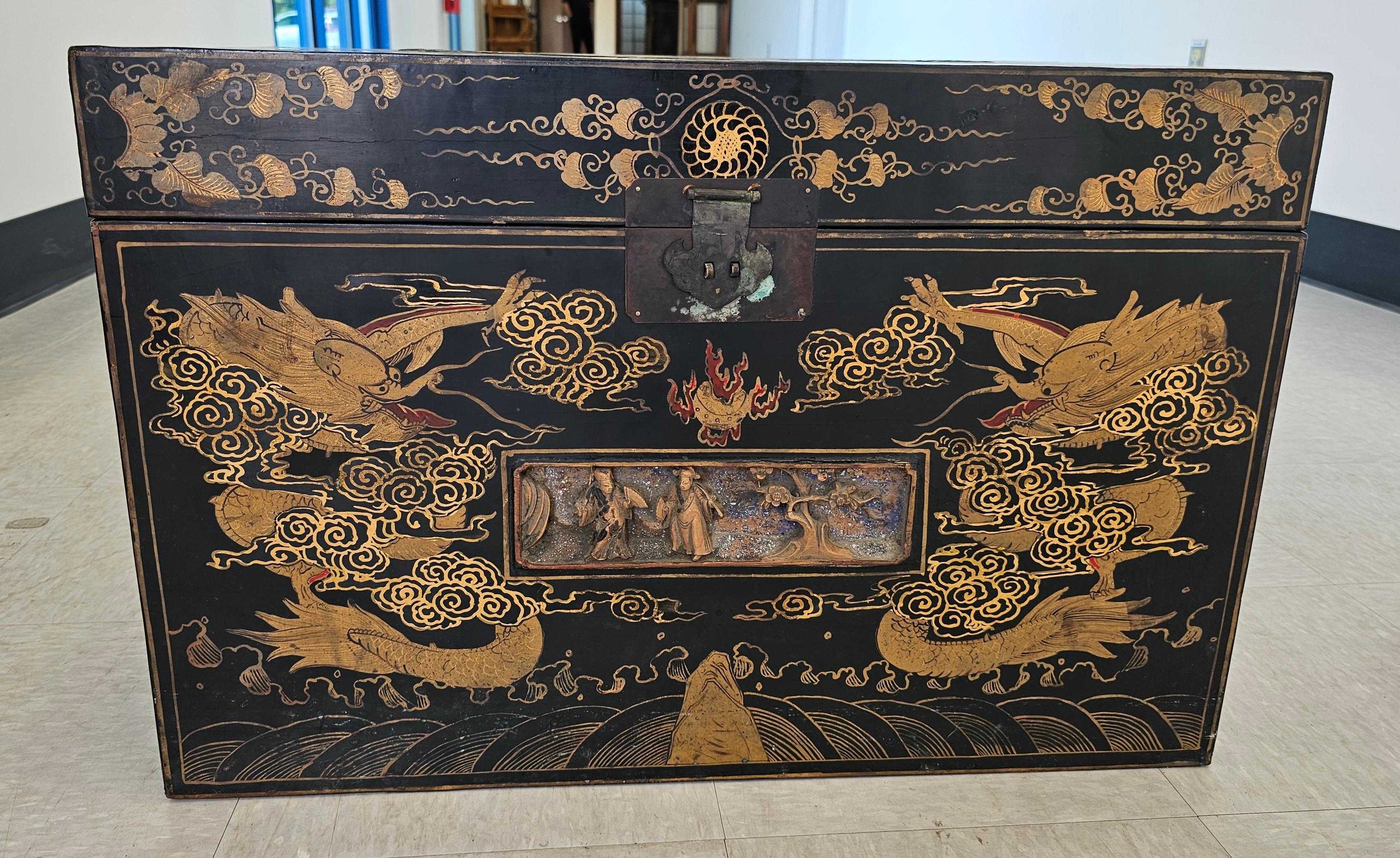 Hardwood Chinese Late Qing Dynasty Ebonized and Partial Gilt Decorated Packing Trunk For Sale