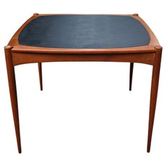 A 1960’s Teak Danish reversible card and dining table by Selig