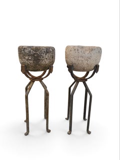 Pair of 19th Century Carved Stone Planters on Wrought Iron Stands