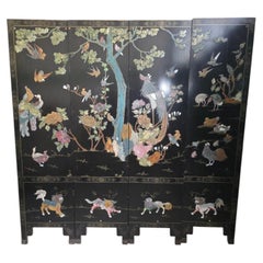Paravento cinese dell’inizio del XX secolo con animali e uccelli intagliati in pietra dura, a