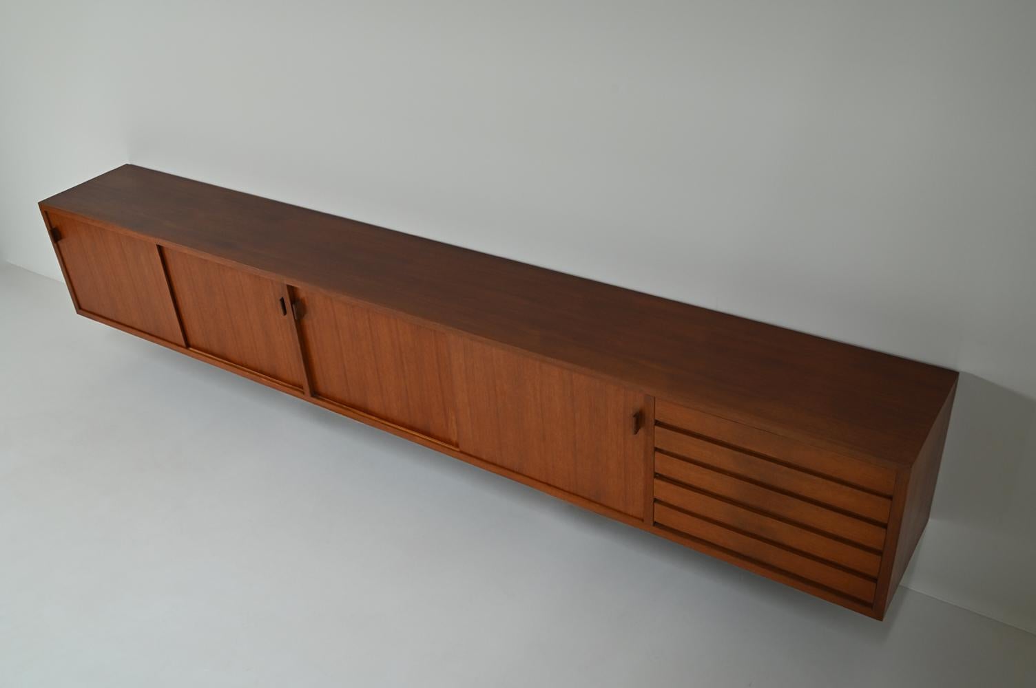 Large mid-century teak floating sideboard, 1960s Germany. In Good Condition For Sale In Landgraaf, NL