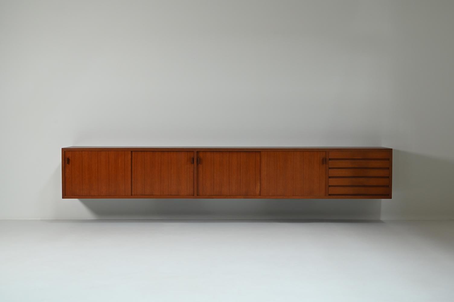 Mid-Century Modern Large mid-century teak floating sideboard, 1960s Germany. For Sale