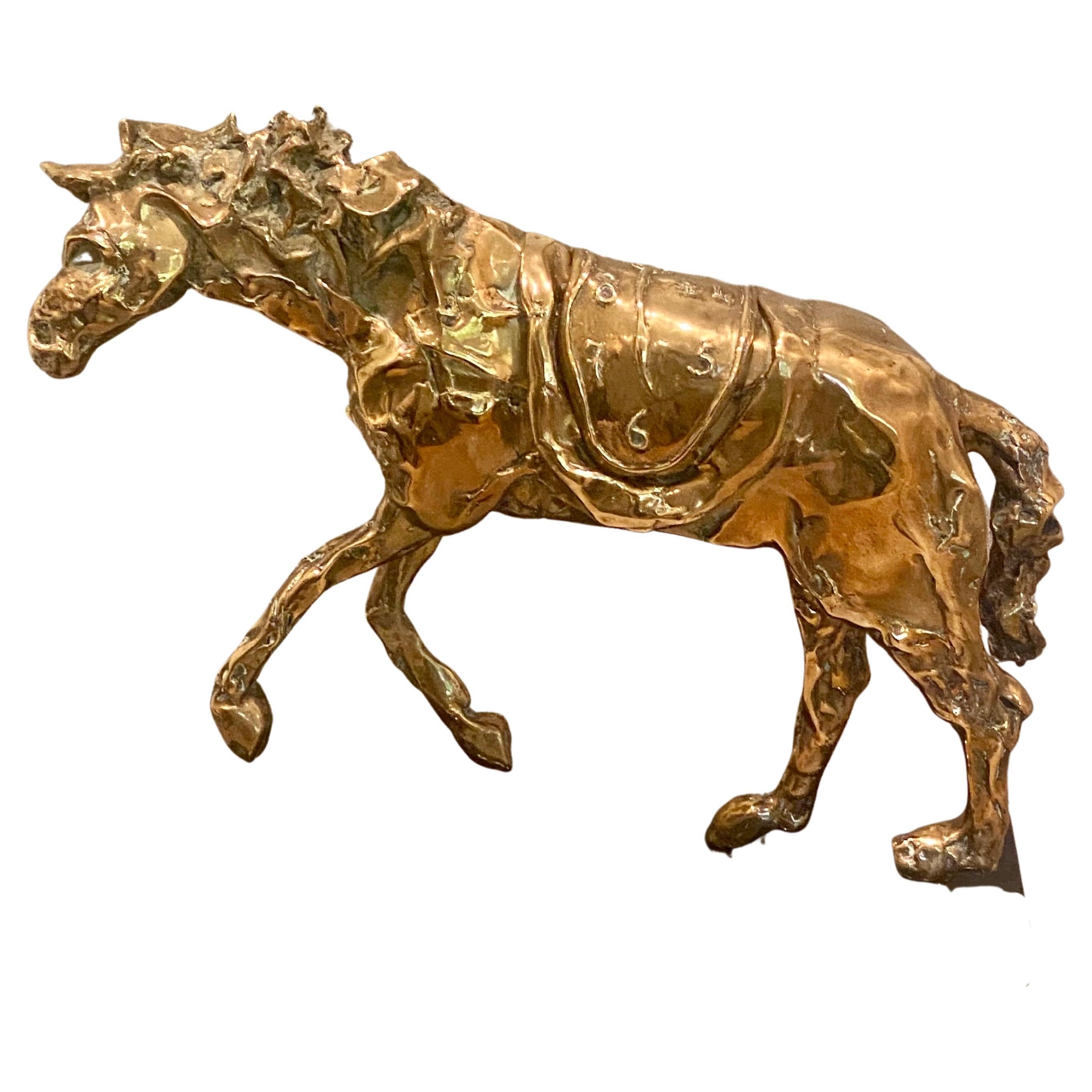 Le cheval à la montre molle
A Superb Bronze by and inscribed by 'Dalí' (on the back right leg), stamped with foundry mark and numbered 314/350 (underneath the saddle) and stamped with foundry mark and dated 'c Camblest 1981' (under the horse)
Solid