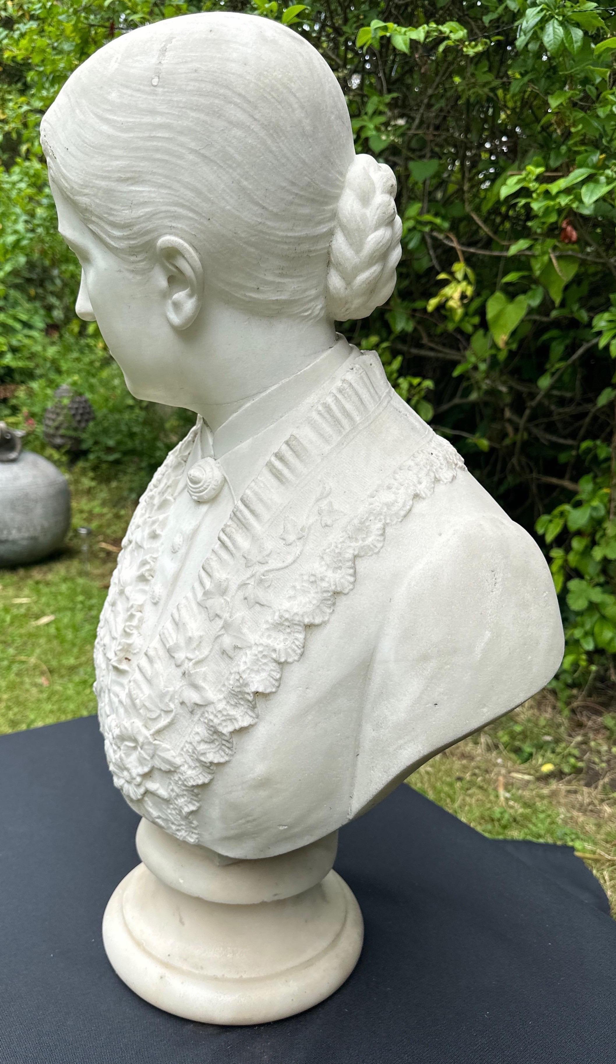 Marble An elegant bust of a lady For Sale