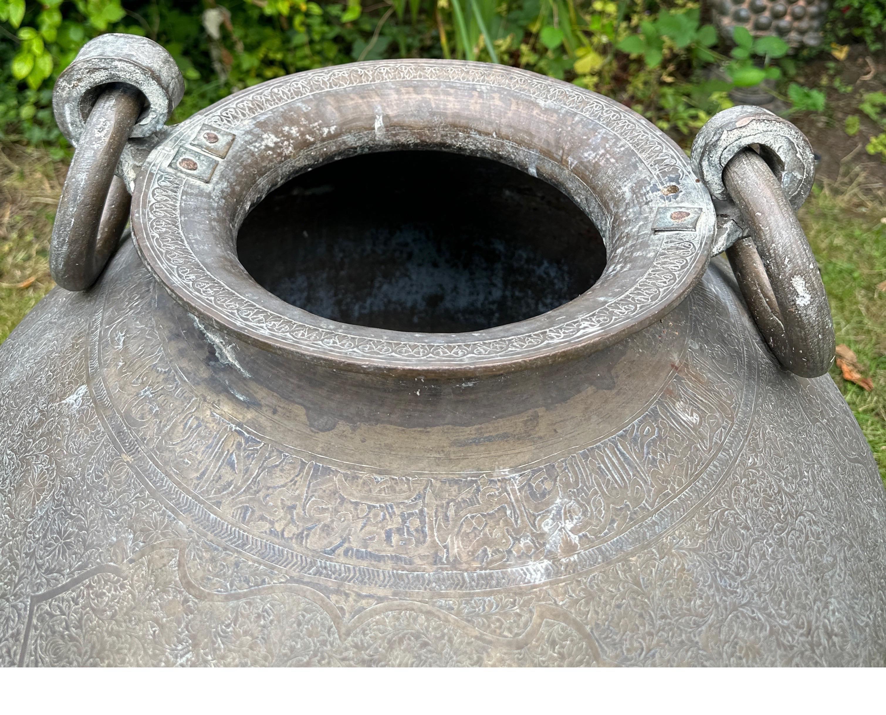 A large Islamic bronze urn  For Sale 10