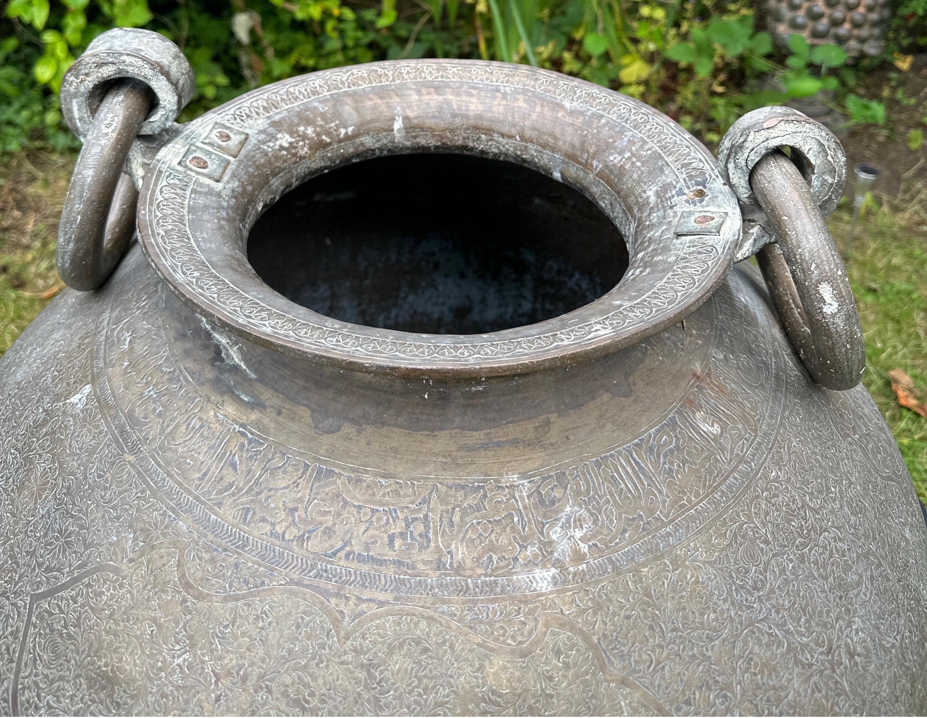 A large Islamic bronze urn  For Sale 11