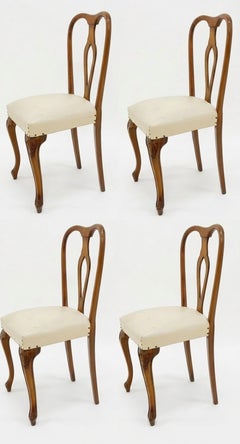 Lot de quatre chaises de collection en noyer, années 1960