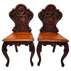 A Rare Pair of 19th Century Heavy Carved Oak English Country House Hall Chairs