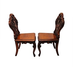 A Rare Pair of 19th Century Heavy Carved Oak English Country House Hall Chairs