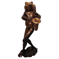 A Very Fine Bronze Animalier Garden Sculpture of a Frog Playing a Saxaphone