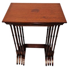 A Gorgeous Edwardian Inlaid Nest of Four Tables