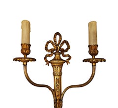 A Stunning Pair of Early 20th Century Gilded Bronze Wall Lights
