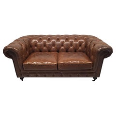 A Fabulous Leather Chesterfield Two Seater Couch in the Victorian Manner