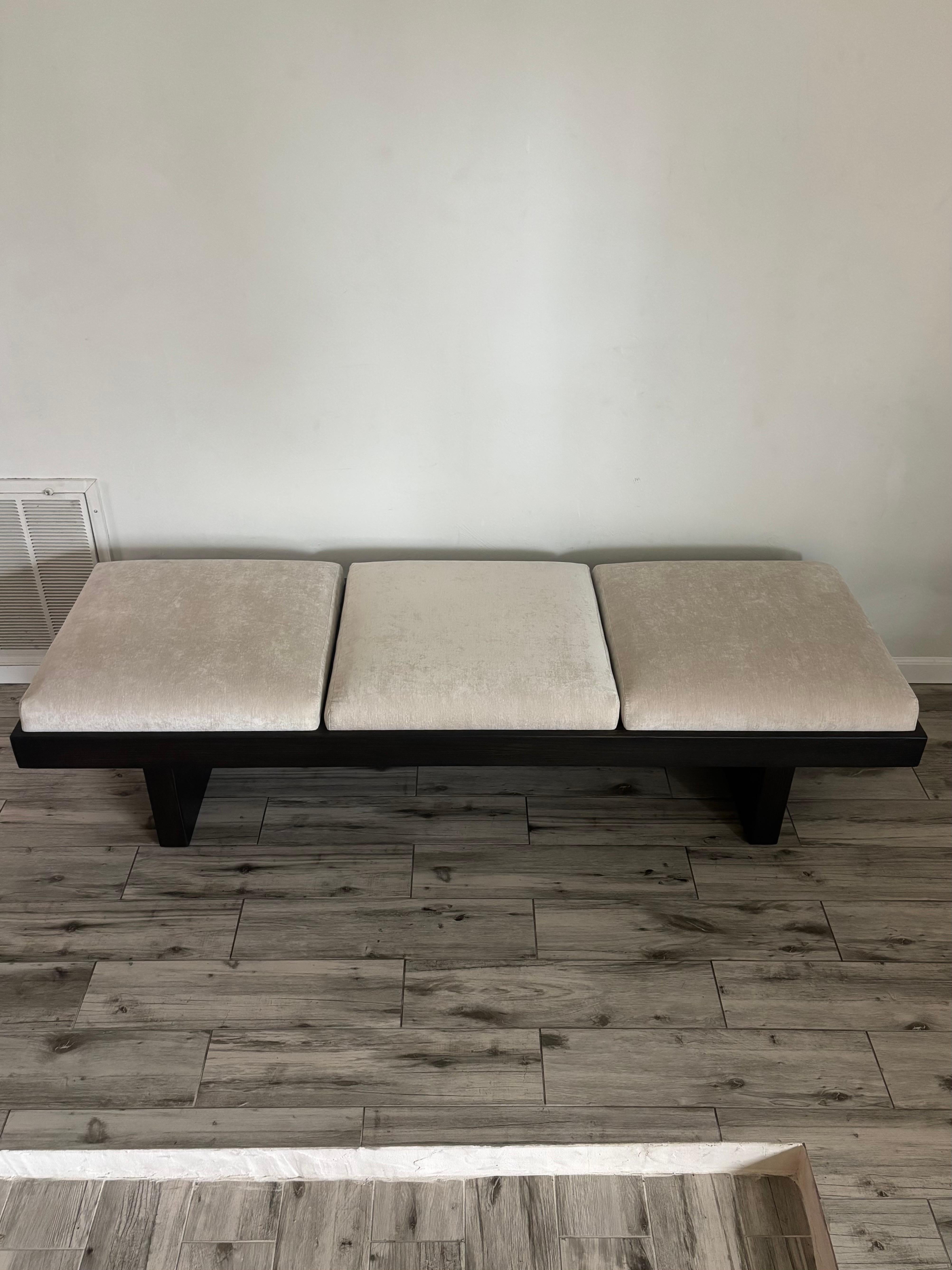 Very rare Mid Century Modern, plinth base, solid oak bench designed by Harvey Probber for his ‘series 70’ line. 

Refinished in an ebonized finish. Looks solid from a distance but as you get close you can see the perfect amount of wood grain peak