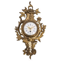 Elegant French Louis XV Style Gilt Metal Cartel Clock
