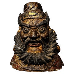 Antica grande testa di legno intagliata "Immagine di Kuan Ti", Cina. XVIII secolo.