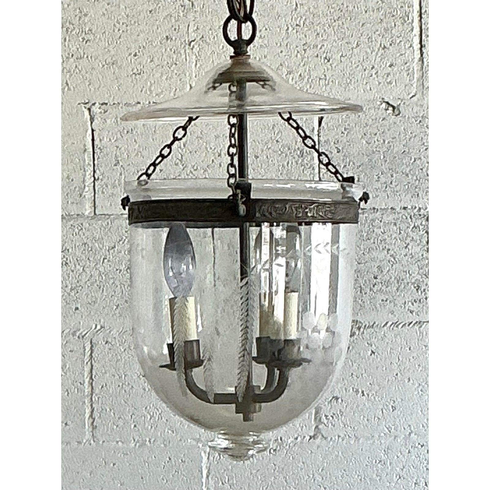 Illuminate your home with the timeless grace of this exquisite vintage bell jar lantern. A beautiful example of classic Regency design, this pendant light features a delicately hand-etched glass shade with elegant botanical fronds and polka dot