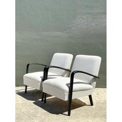 Fauteuils de salon vintage MCM en bois noir - Paire