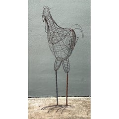 Escultura vintage de un gallo hecha con alambre de hierro
