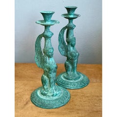 Candelabri vintage in metallo patinato a forma di sfinge alata - Coppia