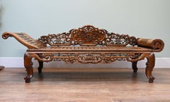 Lit de la dynastie Qing sculpté en bois dur chinois, dit « banc à opium », 1840