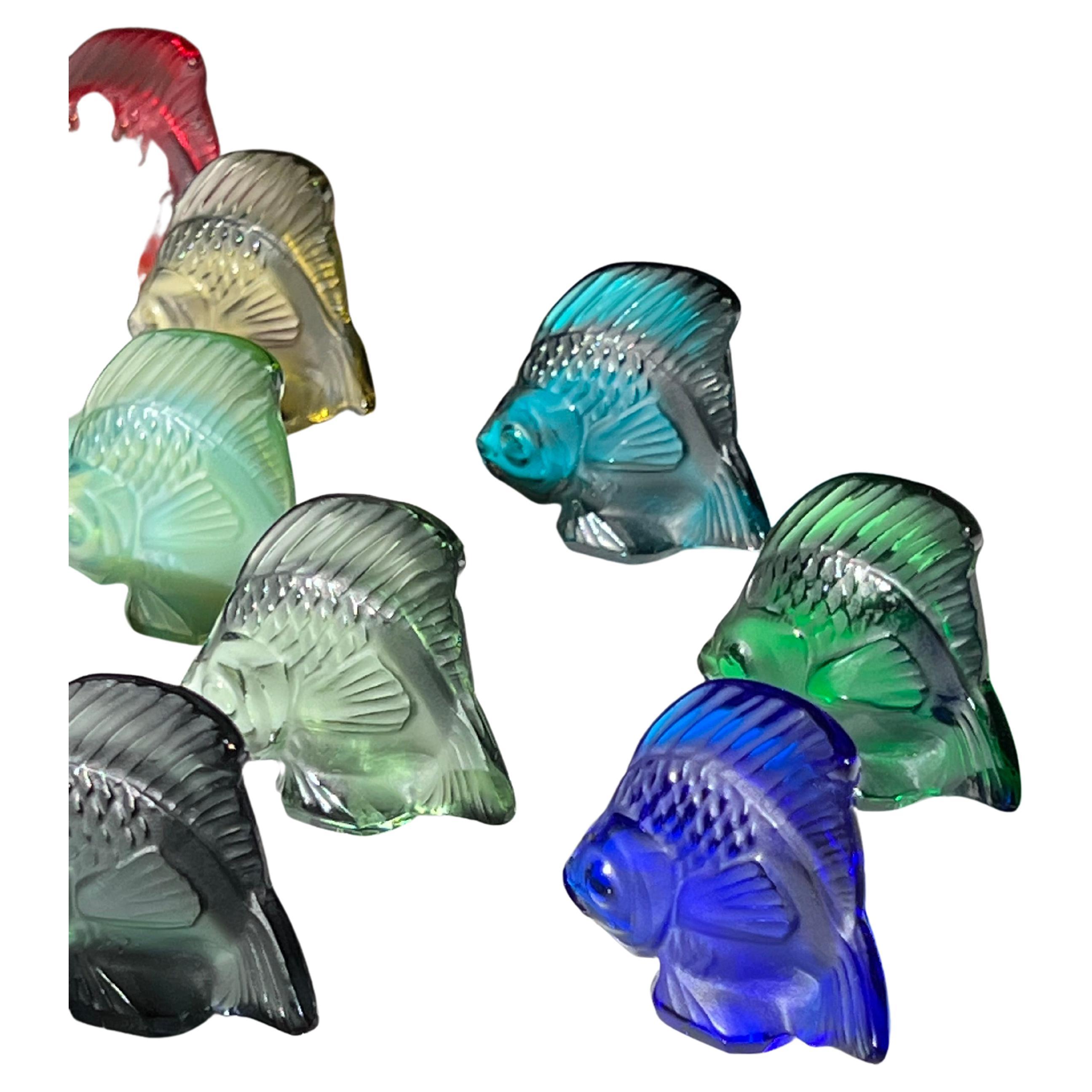 Collection of 16 Lalique Fish Sculptures in Glass
The original Fish in glass was designed in 1913 by René Lalique and since become an important and iconic piece in the Lalique collection. It is now issued in a wide range of colors.

Lalique is a