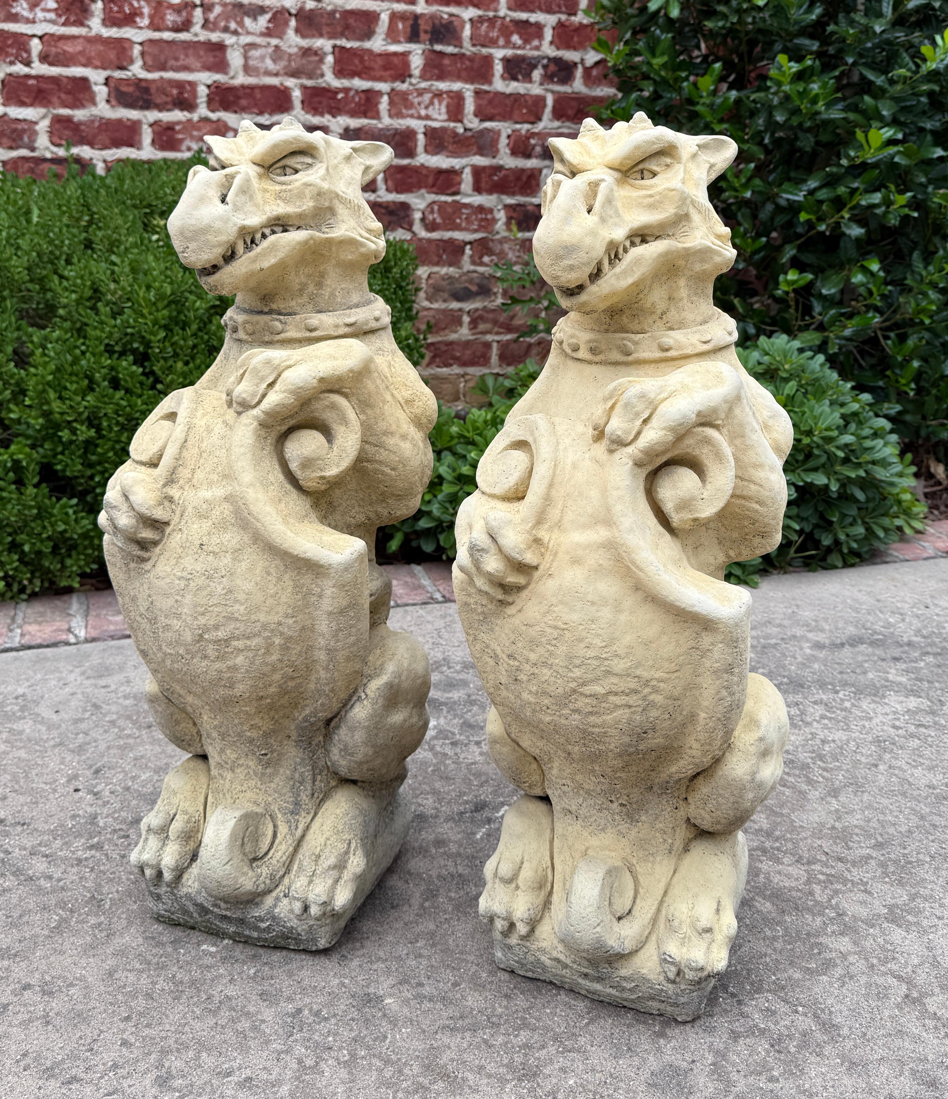 Vintage English Statues Garden Figures Gargoyles Shield Cast Stone Pair In Good Condition For Sale In Tyler, TX