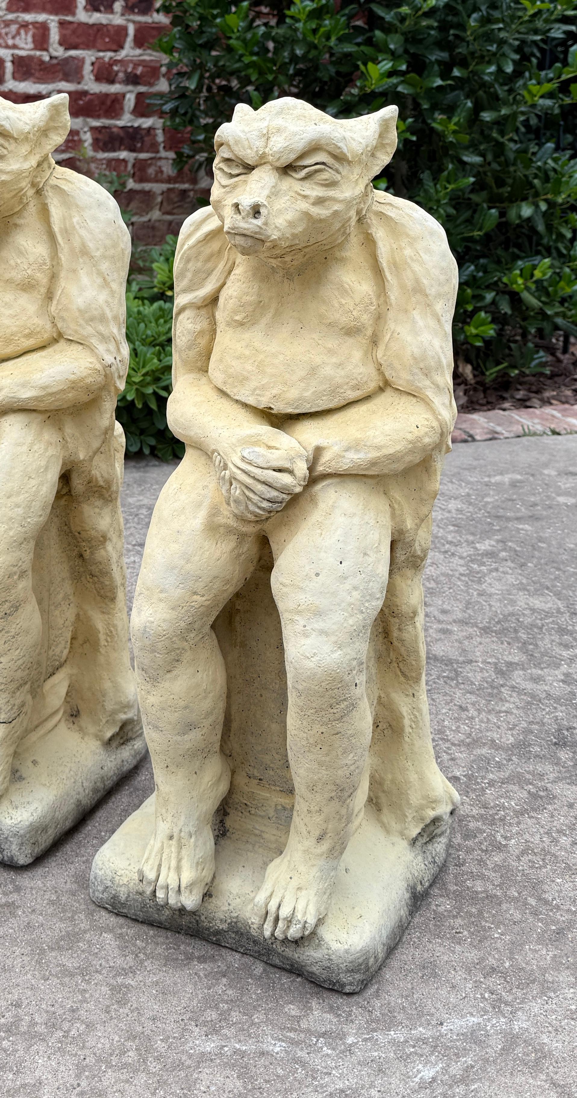 20th Century Vintage English Statues Garden Figures Gargoyles Seated Cast Stone Pair For Sale