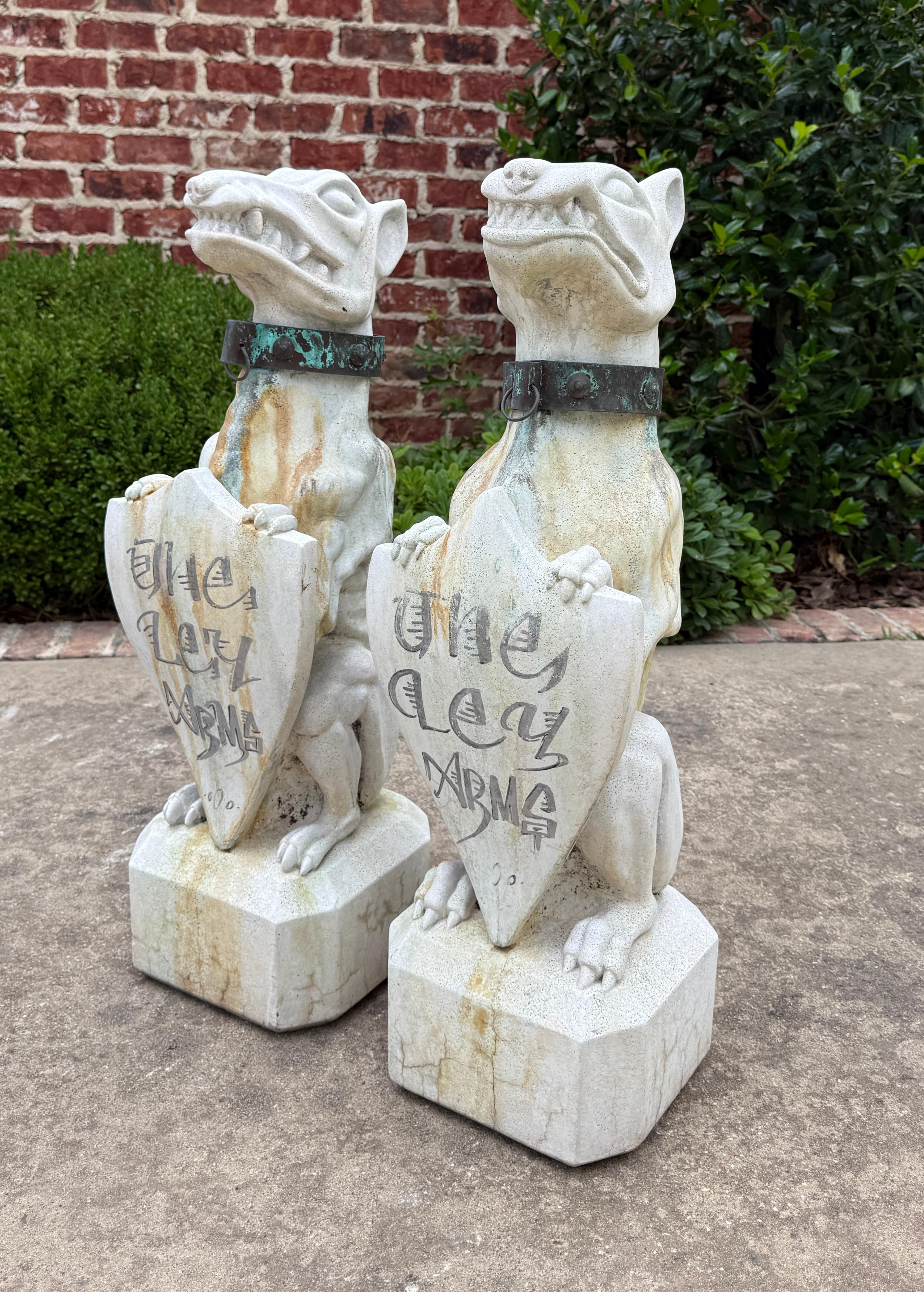 20th Century Vintage English Statues Garden Figures Gargoyles Brass Collars Cast Stone Pair For Sale