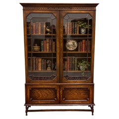 Antique English Jacobean Bookcase Cabinet Double Door Wavy Glass Tiger Oak 1930s