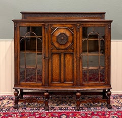 Antique English Jacobean Bookcase Bow Front Cabinet Triple Door Oak c1930s