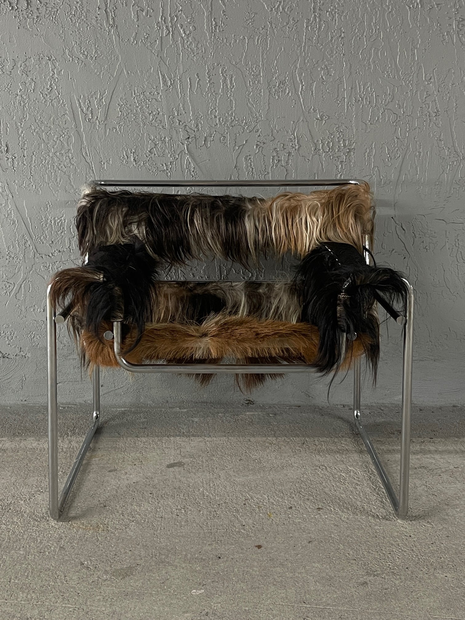 Marcel Breuer 'Wassily' chair, produced before 1968 in Italy by Gavina. Authentic and stamped. The chairs body has a completely original frame and was restored in a beautiful thick coat of New Zealand Exotic Goat Skin to add a luxurious one of a