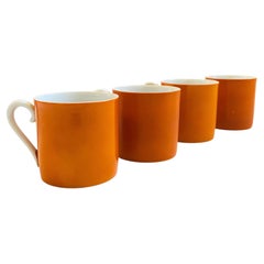 Tasses en céramique orange et blanches du milieu du siècle, lot de 4, vers les années 1960
